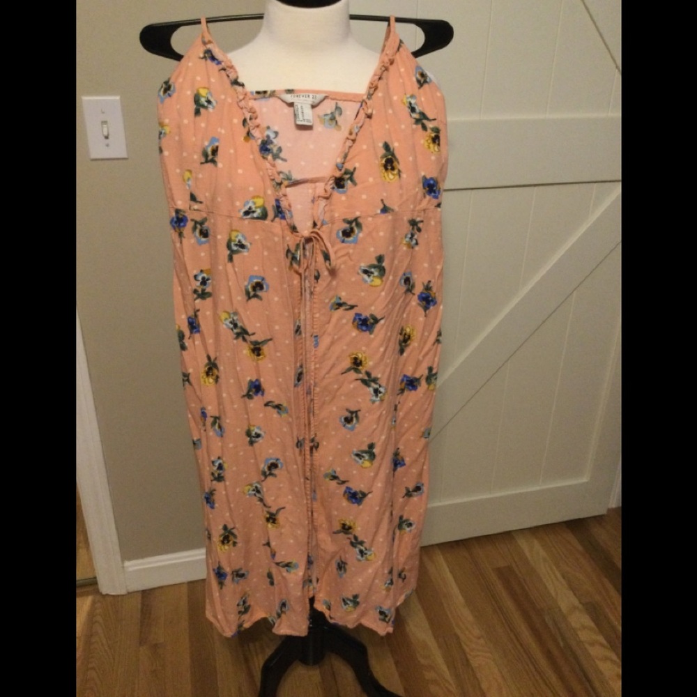 Sleeveless dress with tie front